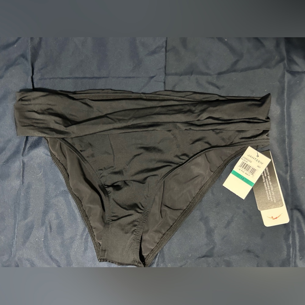 Black women swim bottom. Size 16. Has small emblem on back.